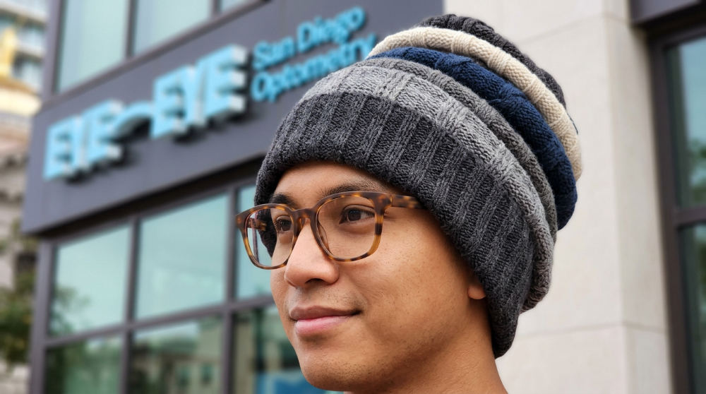 A detailed view of a Stacked Beanie paired with independent designer eyewear for a curated look.